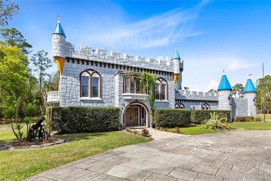 Set behind a gated entrance on 10 private acres in the sought - photo 2