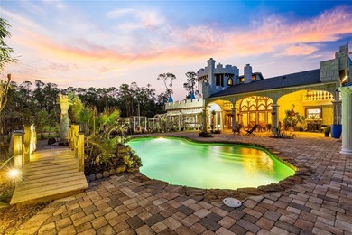 Set behind a gated entrance on 10 private acres in the sought - photo 3
