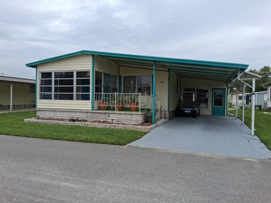 Welcome to beautiful Hudson, Florida. This charming 2-bedroom - photo 2