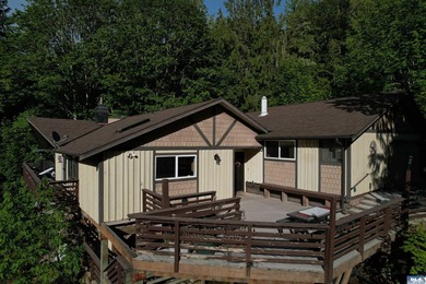 Set on over 5 private acres, this distinctive 2270sf home blends - photo 1