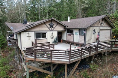 Set on over 5 private acres, this distinctive 2270sf home blends - photo 10