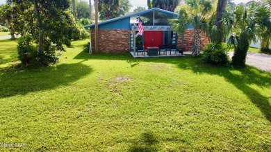 Welcome to 2001 Palm Boulevard, where coastal convenience meets - photo 1