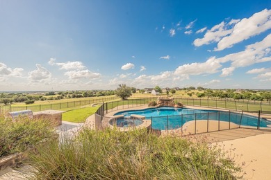 Welcome home to this magnificent estate nestled within the gated - photo 3