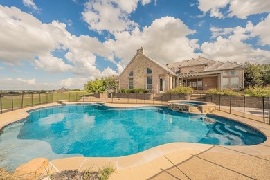 Welcome home to this magnificent estate nestled within the gated - photo 4