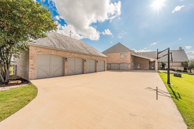 Welcome home to this magnificent estate nestled within the gated - photo 6