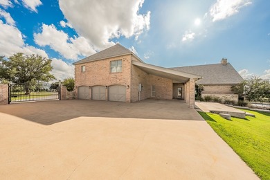 Welcome home to this magnificent estate nestled within the gated - photo 7