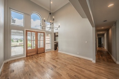 Welcome home to this magnificent estate nestled within the gated - photo 8