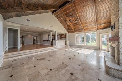 Welcome home to this magnificent estate nestled within the gated - photo 10
