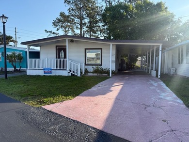 Just listed is this COMPLETELY REMODELED 2-bedroom 2-bathroom - photo 1