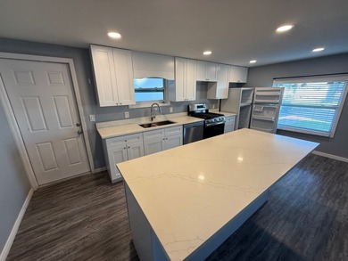 Just listed is this COMPLETELY REMODELED 2-bedroom 2-bathroom - photo 10