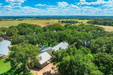 Boasting Nine Active Wells, this +/- 100 acre legacy ranch, just - photo 19