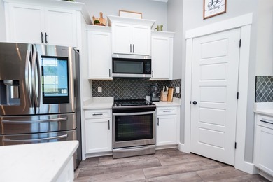 Nestled on 1.58 acres in a gated waterfront community, this - photo 23