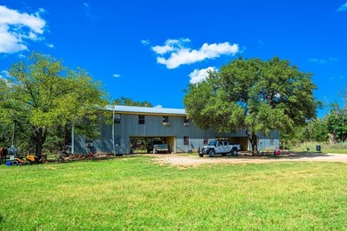 Boasting Nine Active Wells, this +/- 100 acre legacy ranch, just - photo 27