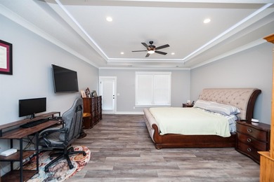 Nestled on 1.58 acres in a gated waterfront community, this - photo 28