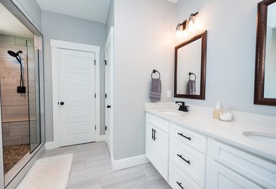 Nestled on 1.58 acres in a gated waterfront community, this - photo 33