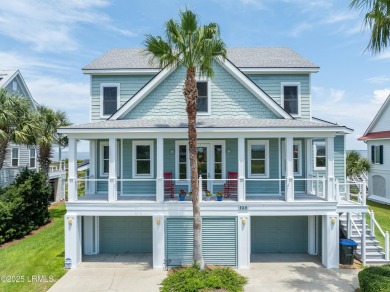 Experience beachfront living like no other at this