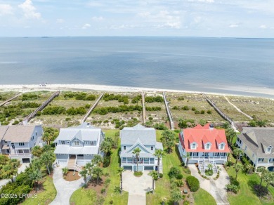 Experience beachfront living like no other at this