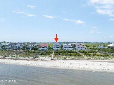 Experience beachfront living like no other at this