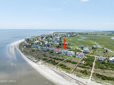 Experience beachfront living like no other at this