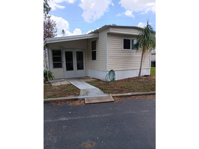 Discover the charm of mobile home living at 2135 Mayfair Way Lot - photo 1
