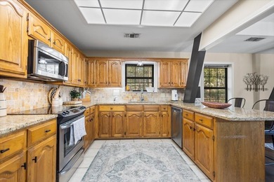 This home delivers immediate curb appeal with a generous front - photo 14