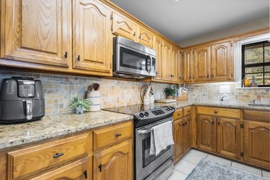 This home delivers immediate curb appeal with a generous front - photo 15
