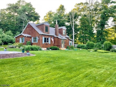 Scenic setting on a level landscaped lot with an abundance of - Lake Home Sale Pending in Mount Olive Twp., New Jersey