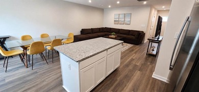 Sold Fully Furnish! Welcome to coastal living at its finest in - photo 9