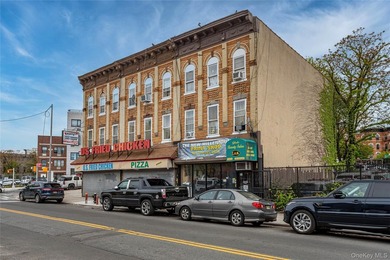 This Mixed use property features 12 units, Storefronts, 12 - photo 3