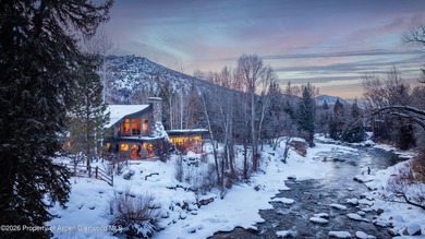 Nestled on two lush acres along the picturesque Roaring Fork - photo 2