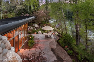 Nestled on two lush acres along the picturesque Roaring Fork - photo 5