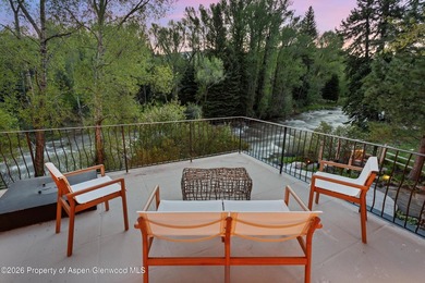 Nestled on two lush acres along the picturesque Roaring Fork - photo 6