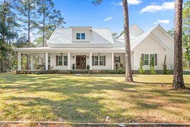 Bay Living! Tucked away on a quiet private road in the heart of - photo 1