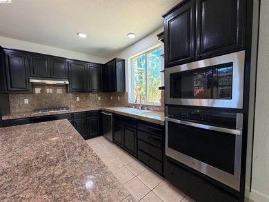 Price Improved! Move-in ready 5 bedroom, 3 bath home offering - photo 21