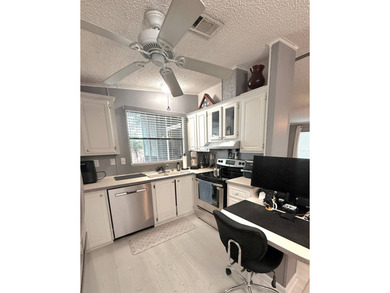 NEW LISTING!! STUNNING 2 BEDROOM 2 BATH WITH SCREENED IN RAISED - photo 8