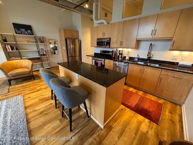 Beautiful 2nd story condo in the Market Street Lofts is the