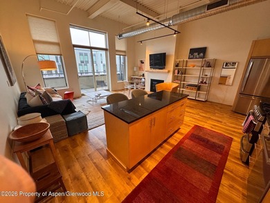 Beautiful 2nd story condo in the Market Street Lofts is the