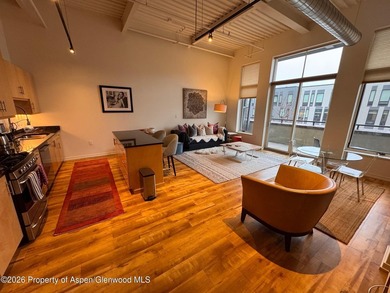 Beautiful 2nd story condo in the Market Street Lofts is the