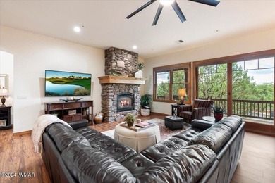 Welcome to a home that truly lives easy yet expansive. With - photo 18