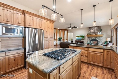 Welcome to a home that truly lives easy yet expansive. With - photo 21