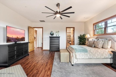 Welcome to a home that truly lives easy yet expansive. With - photo 24