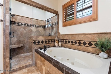 Welcome to a home that truly lives easy yet expansive. With - photo 26