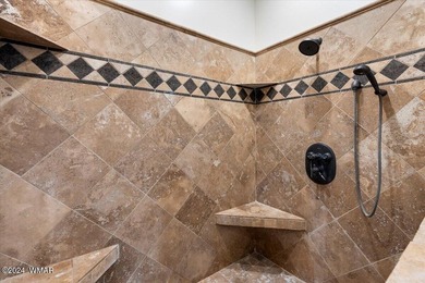 Welcome to a home that truly lives easy yet expansive. With - photo 27