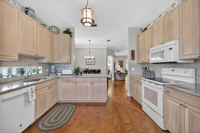Situated on a large corner lot with lush tropical landscaping - photo 12