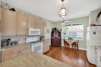 Situated on a large corner lot with lush tropical landscaping - photo 15