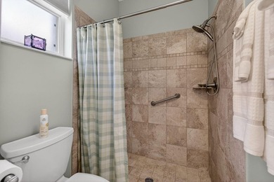 Situated on a large corner lot with lush tropical landscaping - photo 30
