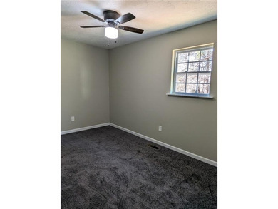 Fully renovated ranch with a daylight basement. Arrive at a