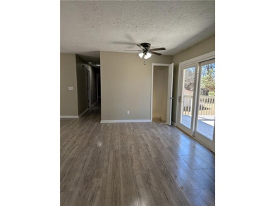 Fully renovated ranch with a daylight basement. Arrive at a