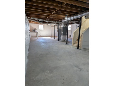 Fully renovated ranch with a daylight basement. Arrive at a