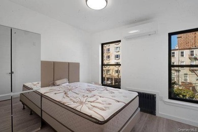 Turnkey, four-story two-family townhouse with cellar, offering - photo 8